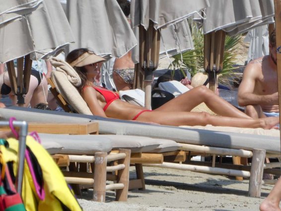 Izabel Goulart in Red Bikini at the beach in Mykonos