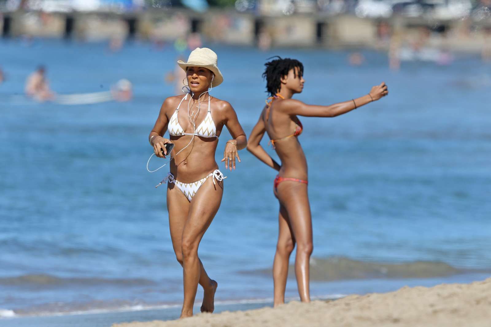 Jada Pinkett Smith in White Bikini at a Beach in Hawaii. 