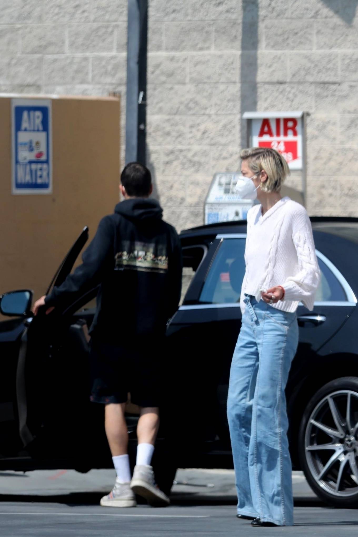 Jaime King â€“ Seen cleaning her Car