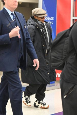 Janet Jackson - Exuded effortless style as she touched down at JFK airport in New York
