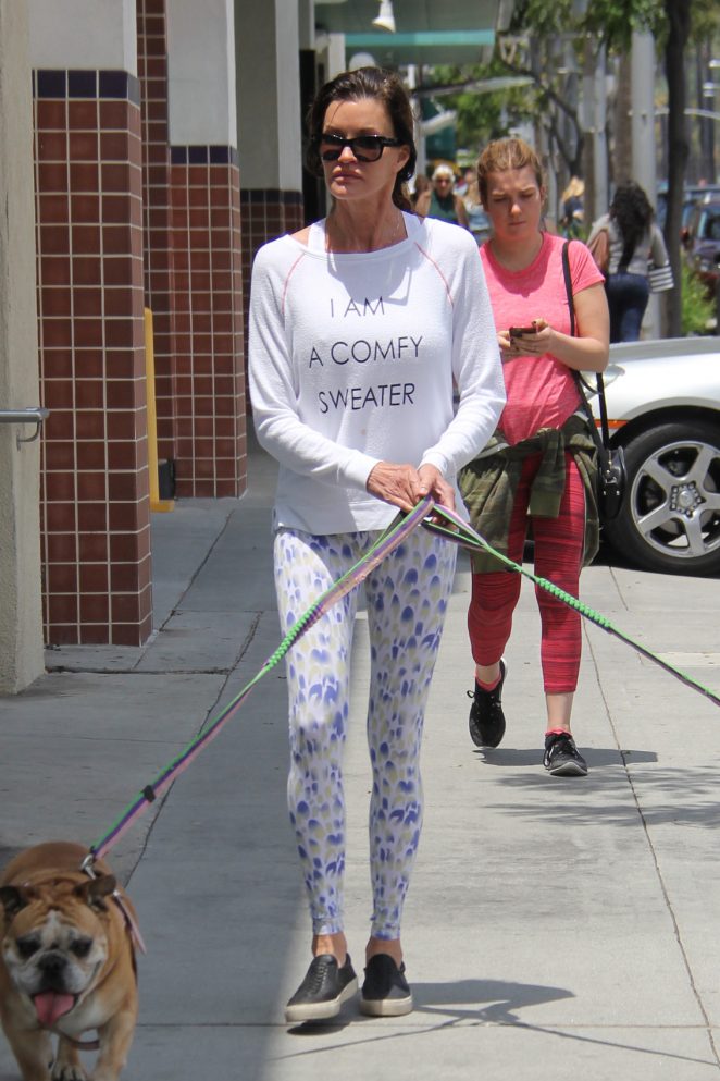 Janice Dickinson walking her two dogs in Beverly Hills