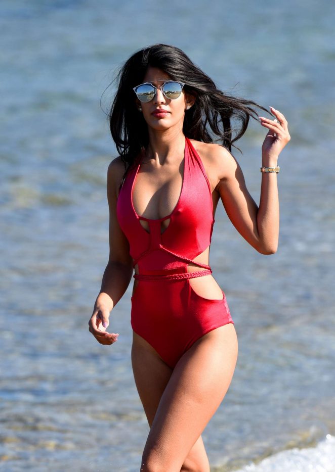 Jasmin Walia in Red Swimsuit at a beach in Ibiza