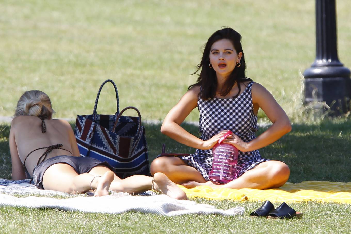 Jenna Coleman - Enjoying a picnic with a female friend in a London park. 