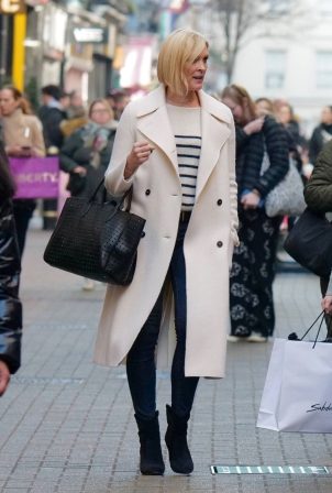 Jenni Falconer - In a white coat while spotted shopping at Sweaty Betty in London