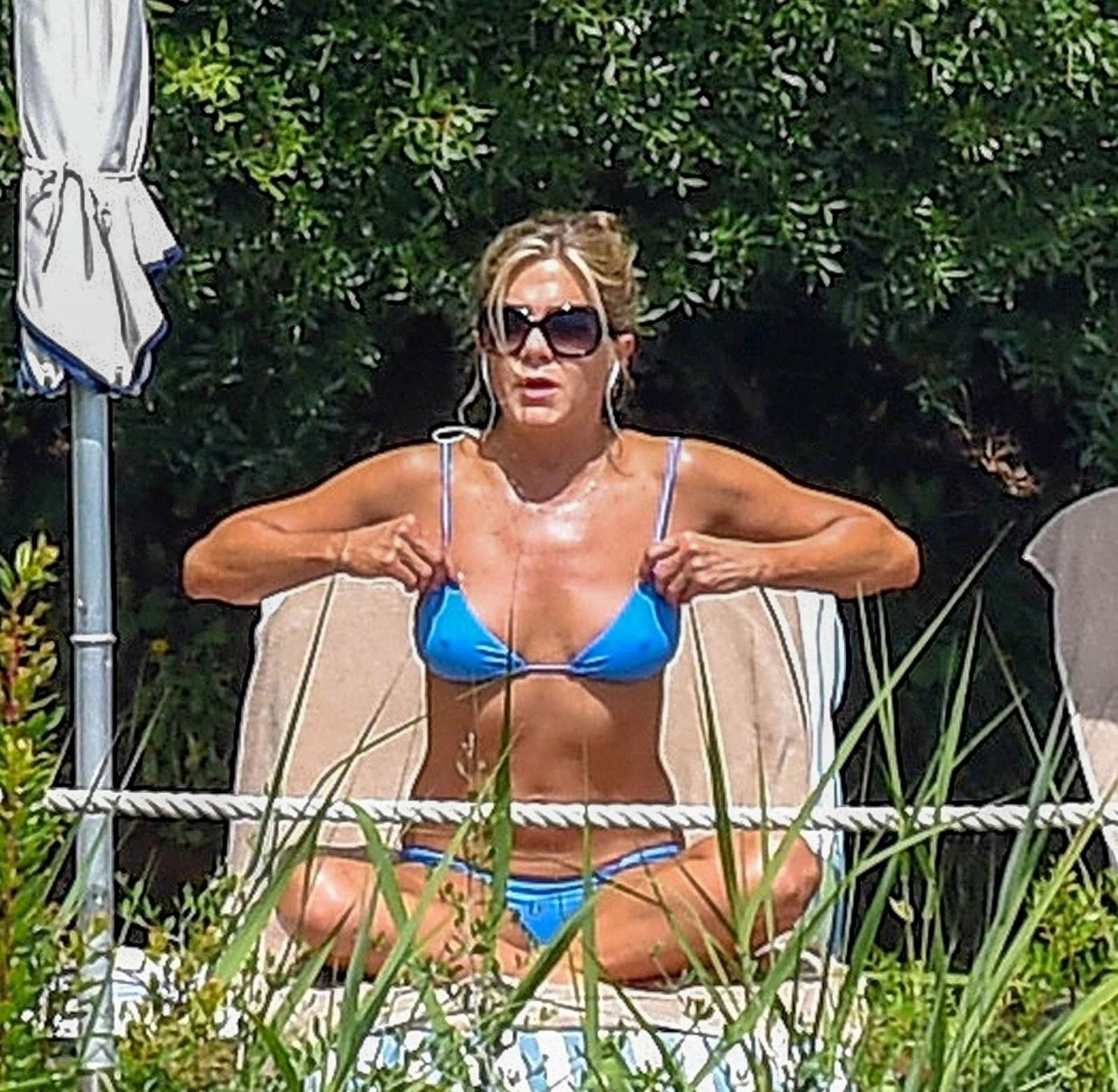 Jennifer Aniston in Blue Bikini at the pool in Portofino. 