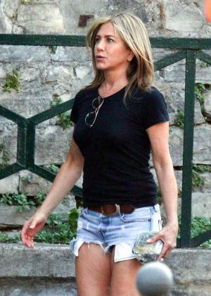 Jennifer Aniston in Jeans Shorts - Leaving the set of 'Murder Mystery' in Lake Como