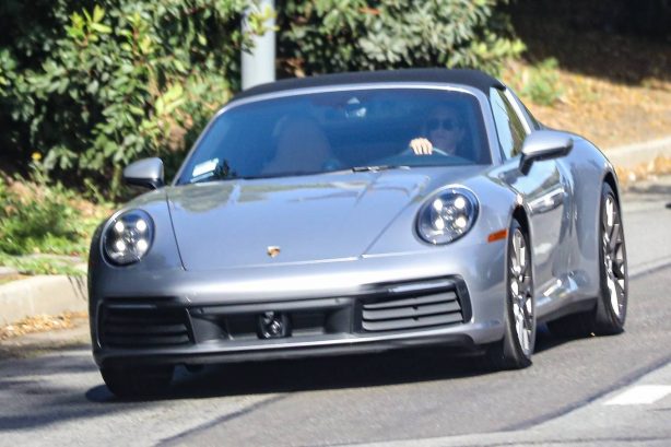 Jennifer Aniston - Seen at her Porsche 911 Targa after a pilates class in West Hollywood