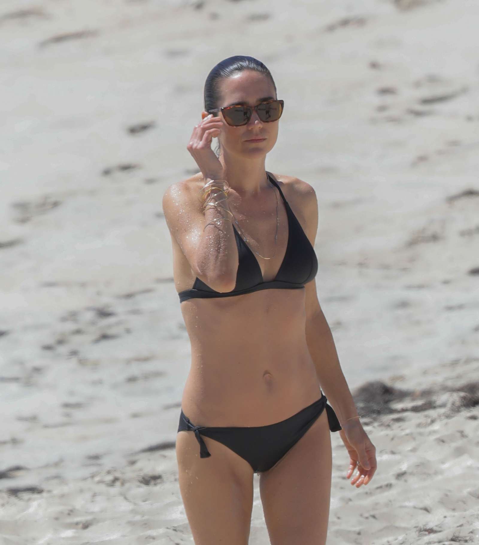 Jennifer Connelly in Black Bikini at a beach in St Barts. 