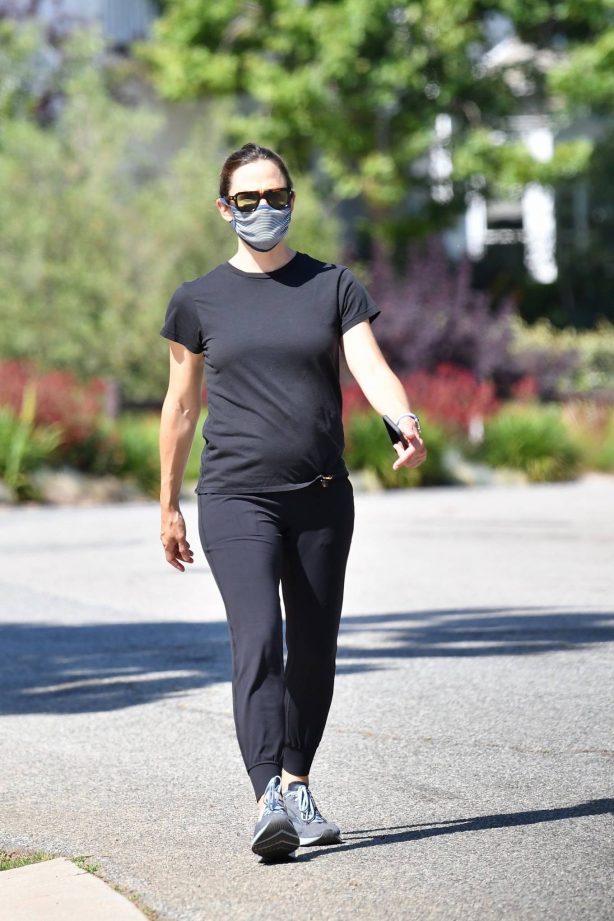 Jennifer Garner takes a walk with a friend in her neighborhood of Brentwood