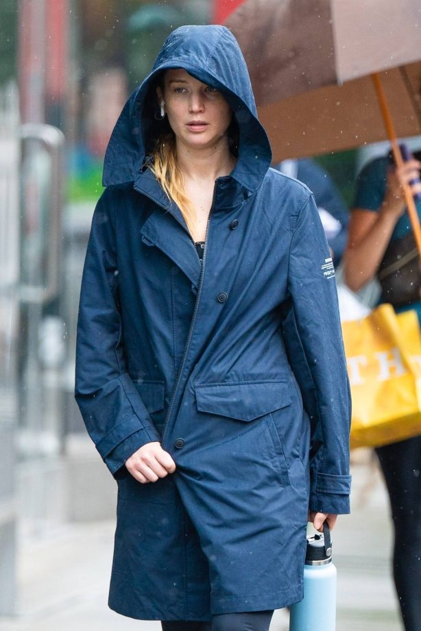 Jennifer Lawrence - Braves the rain in NYC