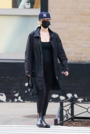 Jennifer Lawrence - In an all-black ensemble running errands in New York