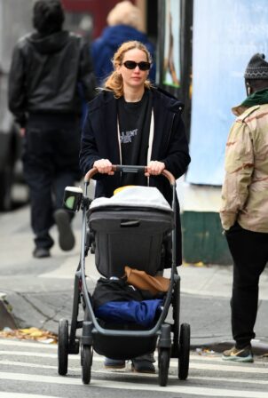 Jennifer Lawrence - Out for a walk with baby on stroller in New York