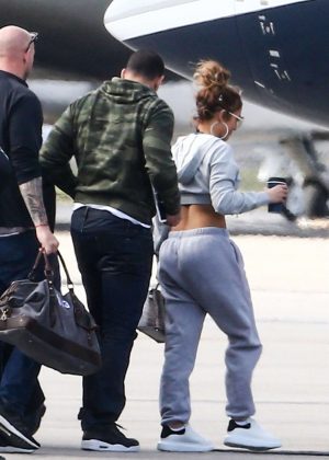 Jennifer Lopez and Alex Rodriguez - Boarding a private jet in Miami