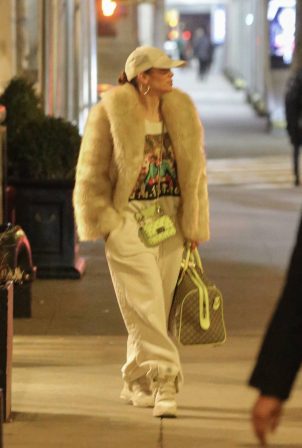 Jennifer Lopez - In a fur and TWO designer bags including a monogrammed GUCCI duffel in New York
