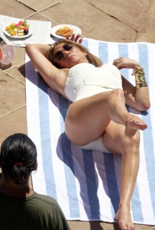 Jennifer Lopez - In a swimsuit on a photoshoot in Capri