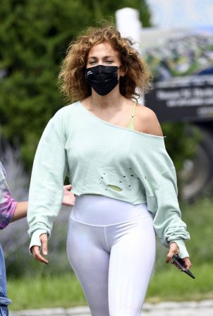 Jennifer Lopez - In white leggings out in Water Mill in New York