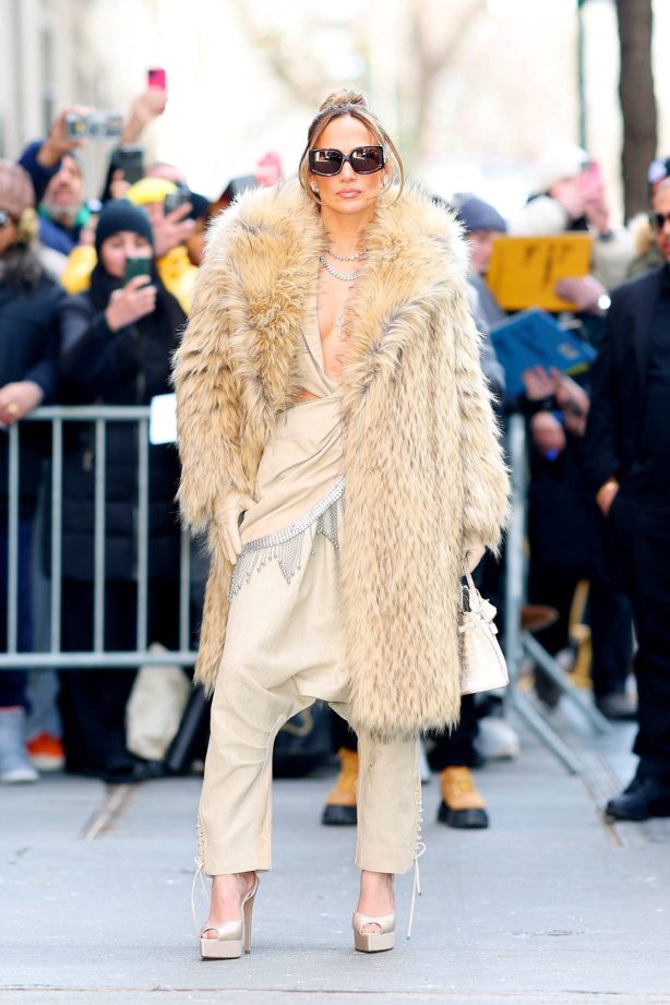 Jennifer Lopez - Posing at her billboard in Times Square in New York