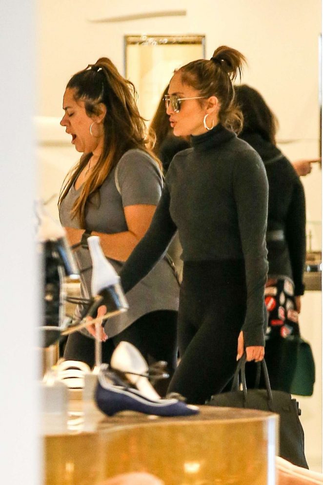 Jennifer Lopez shopping with her assistant at Barneys NY in LA