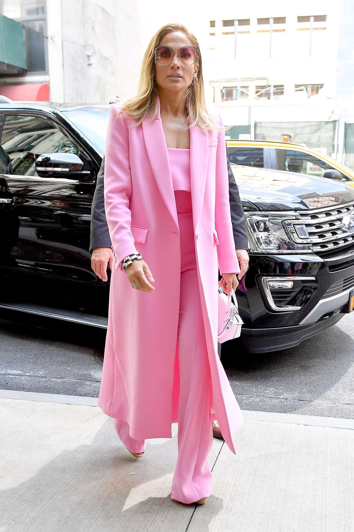 Jennifer Lopez - Wearing all pink business suit-03 | GotCeleb