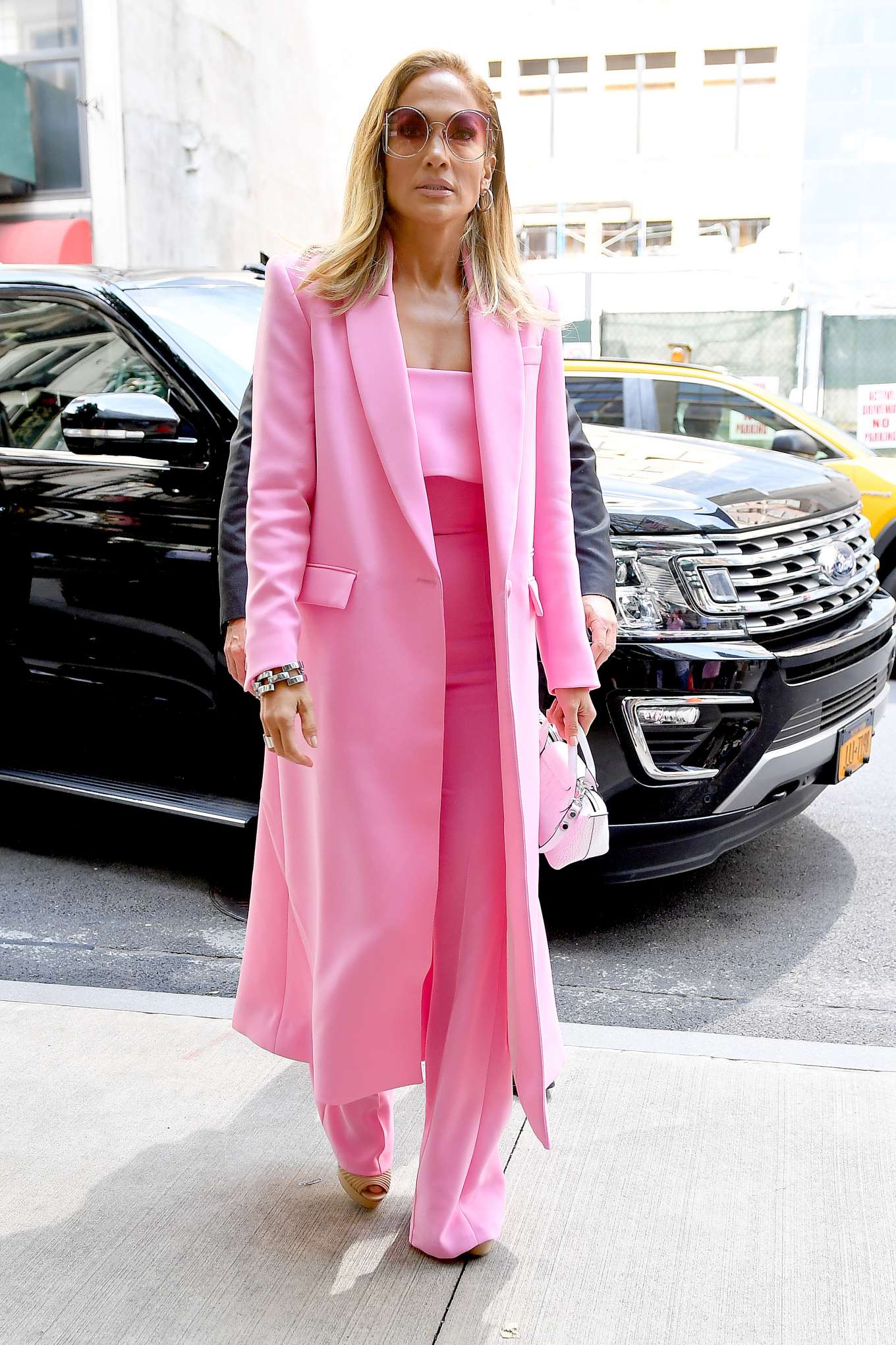 Jennifer Lopez - Wearing all pink business suit-09 | GotCeleb