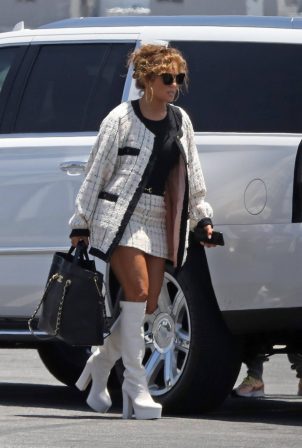 Jennifer Lopez - Wearing mini skirt and knee boots with Alex Rodriguez in Van Nuys