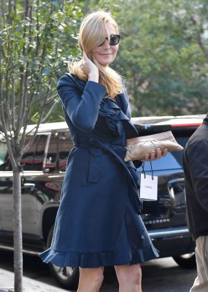 Jennifer Westfeldt in a blue coat out in New York City