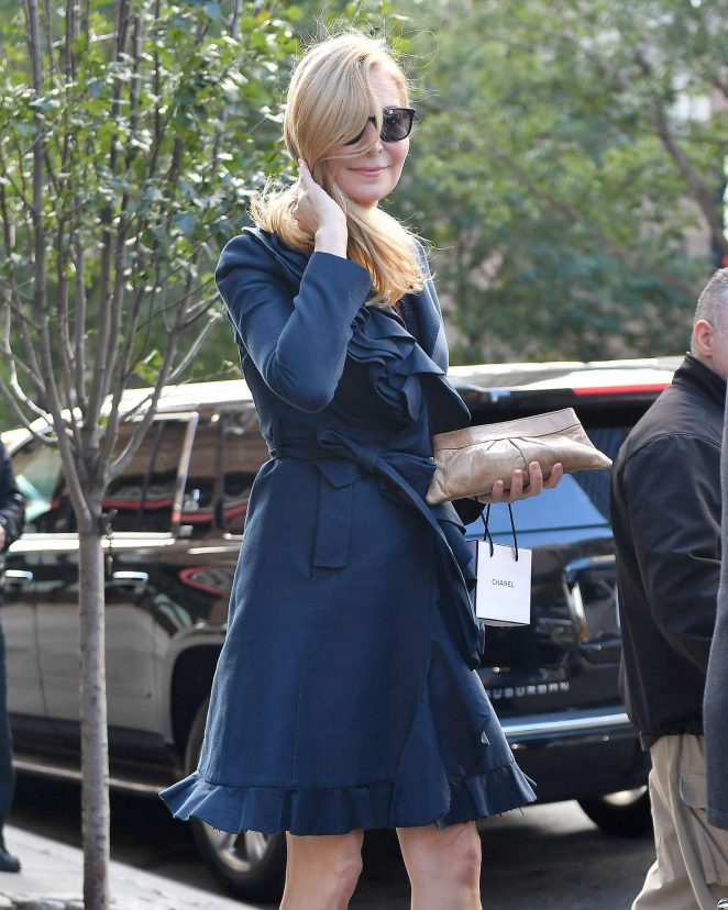 Jennifer Westfeldt in a blue coat out in New York City