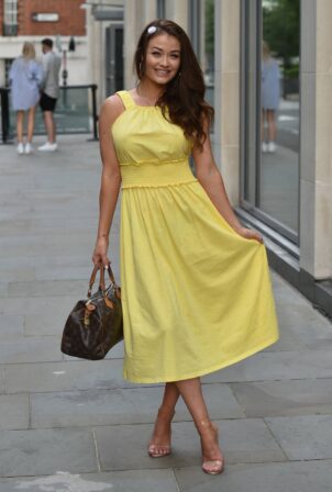 Jess Impiazzi - Out for a stroll in a yellow dress