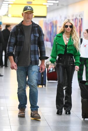 Jessica Simpson - With her husband Eric Johnson spotted at JFK Airport in New York