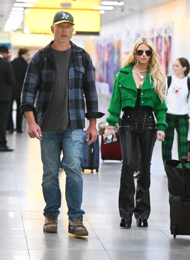 Jessica Simpson - With her husband Eric Johnson spotted at JFK Airport in New York