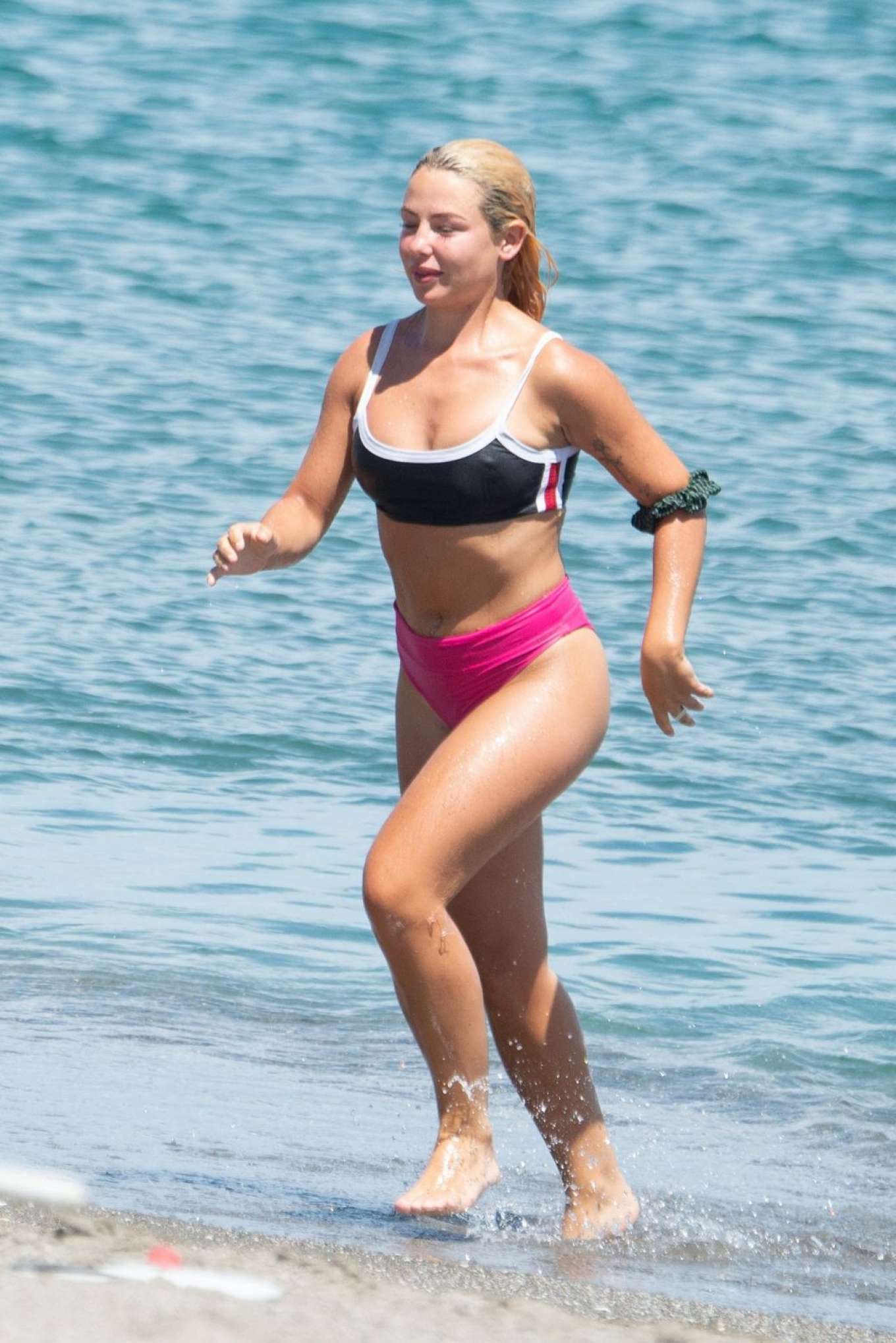 Jessica Woodley and Georgia Toffolo in Bikini on the beach in Sotogrande