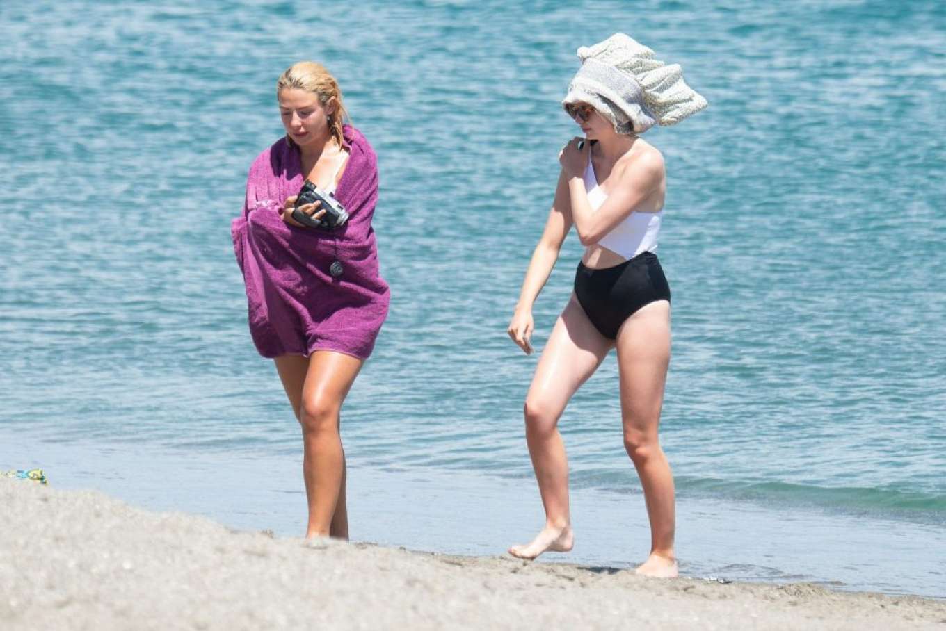 Jessica Woodley and Georgia Toffolo in Bikini on the beach in Sotogrande