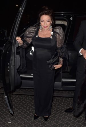 Joan Collins - Arriving at The Shooting Stars Ball at the Royal Lancaster Hotel in London