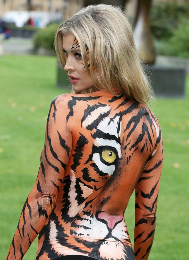 Joanna Krupa - Bodypaint while protesting outside Westminster in London