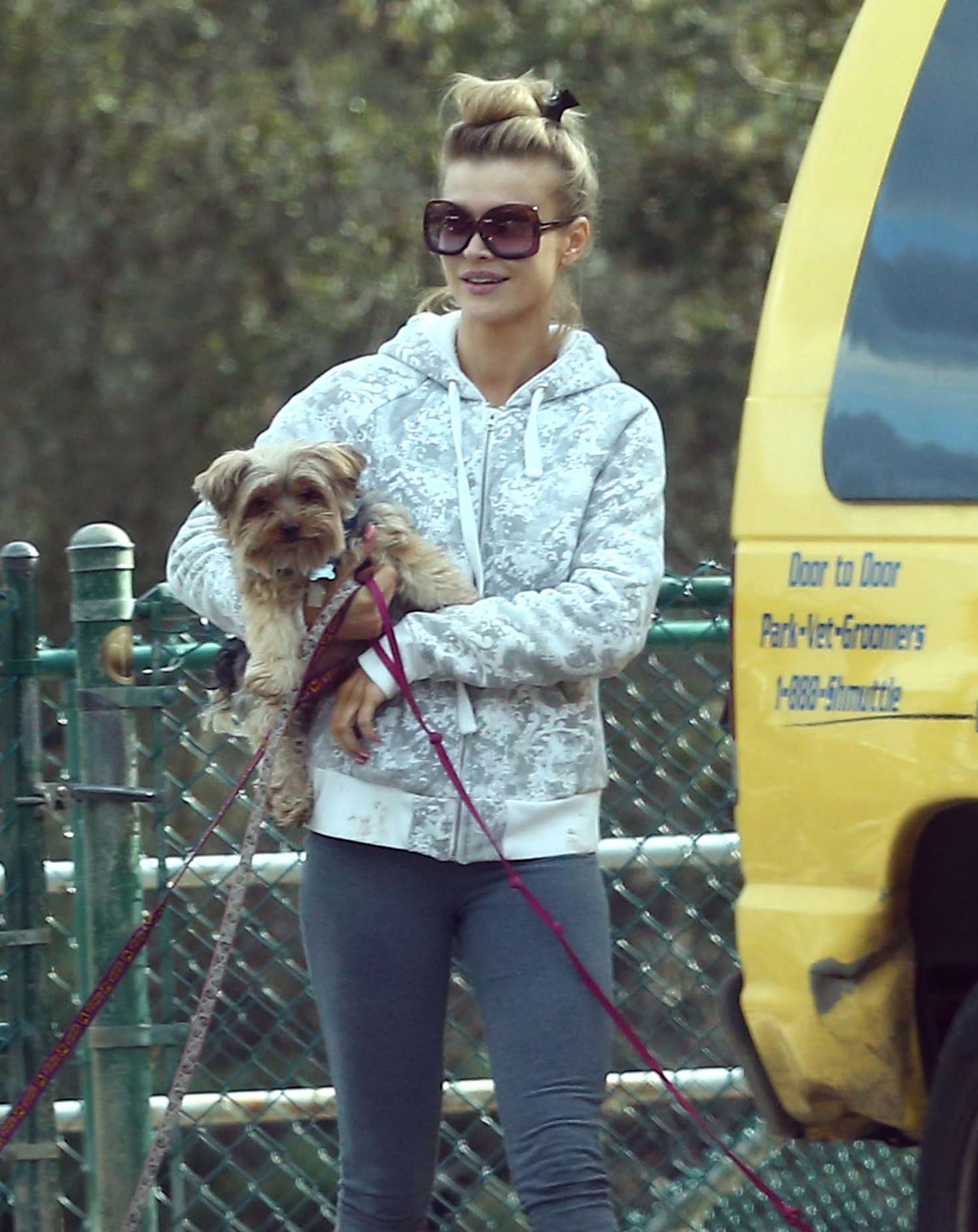 Joanna Krupa with her dogs at a park in Hollywood