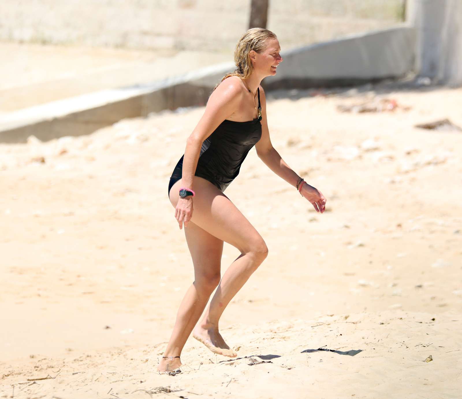 Jodie Kidd in Black Swimsuit at the beach in Barbados. 