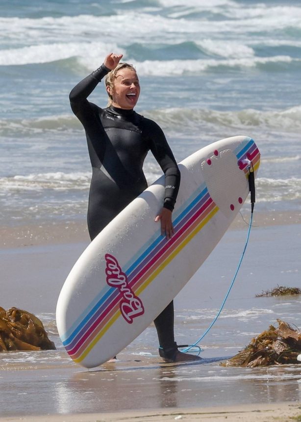 Jojo Siwa - Pictured surfing along with her dad in Malibu