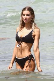 Joy Corrigan in Black Bikini on the beach in Miami Beach