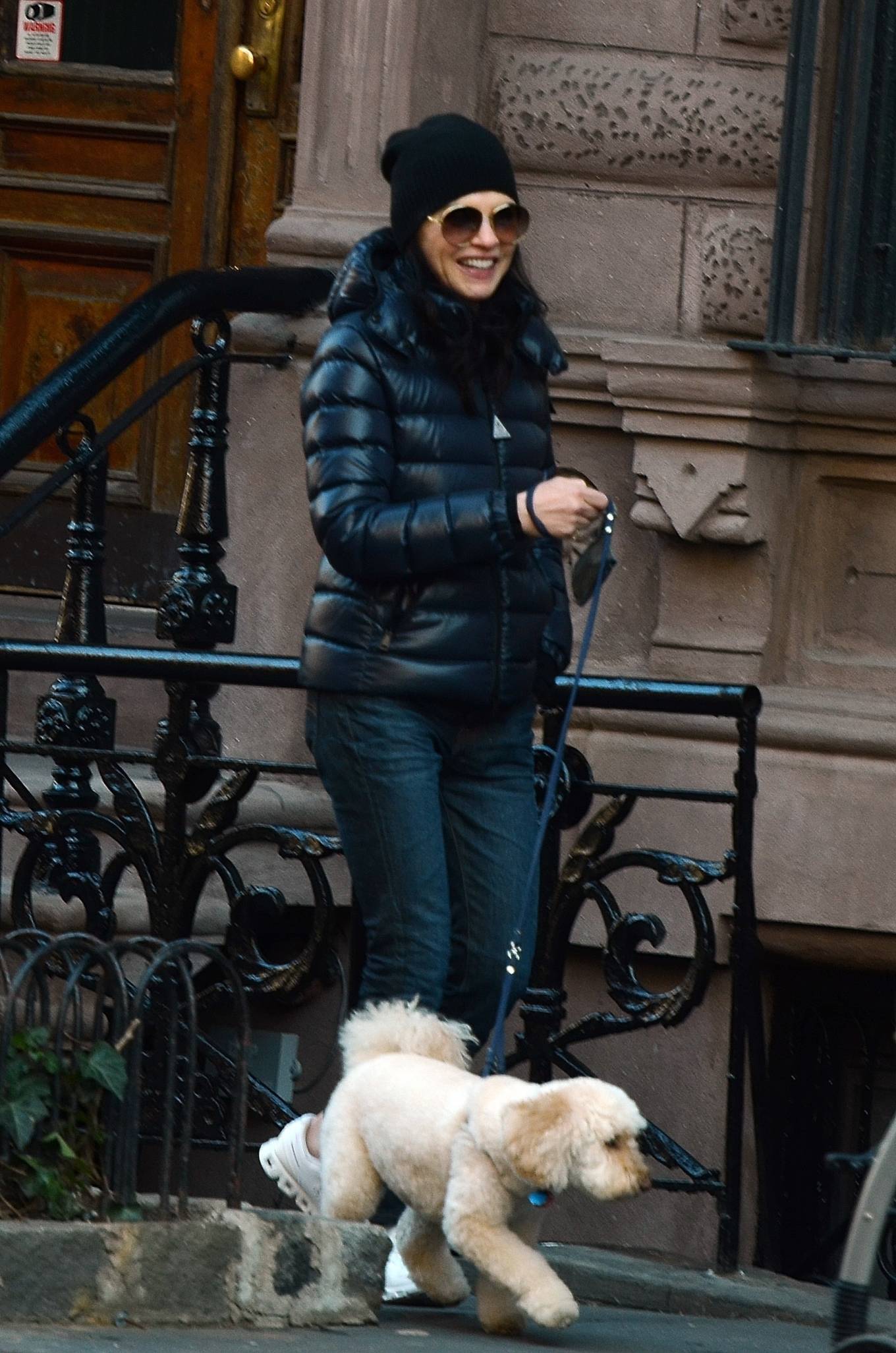 Julianna Margulies - Enjoys a stroll with her pooch in New York