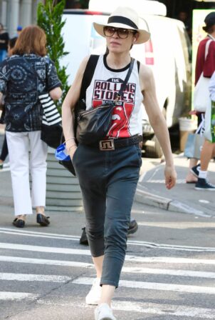 Julianna Margulies - In a The Rolling Stones tank top seen around Manhattan’s Soho area