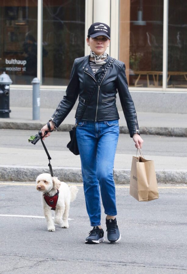 Julianna Margulies - Wearing a black biker’s leather jacket in Manhattan’s SoHo area