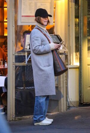 Julianne Moore - In a grey trench coat and denim combo out in New York