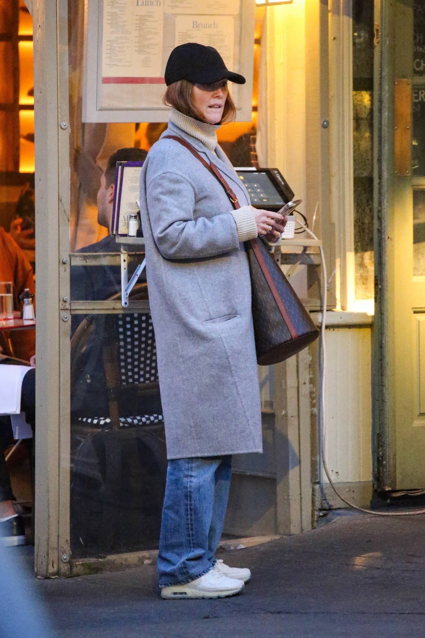 Julianne Moore - In a grey trench coat and denim combo out in New York