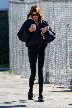 Kaia Gerber - On her phone after a workout in Brentwood