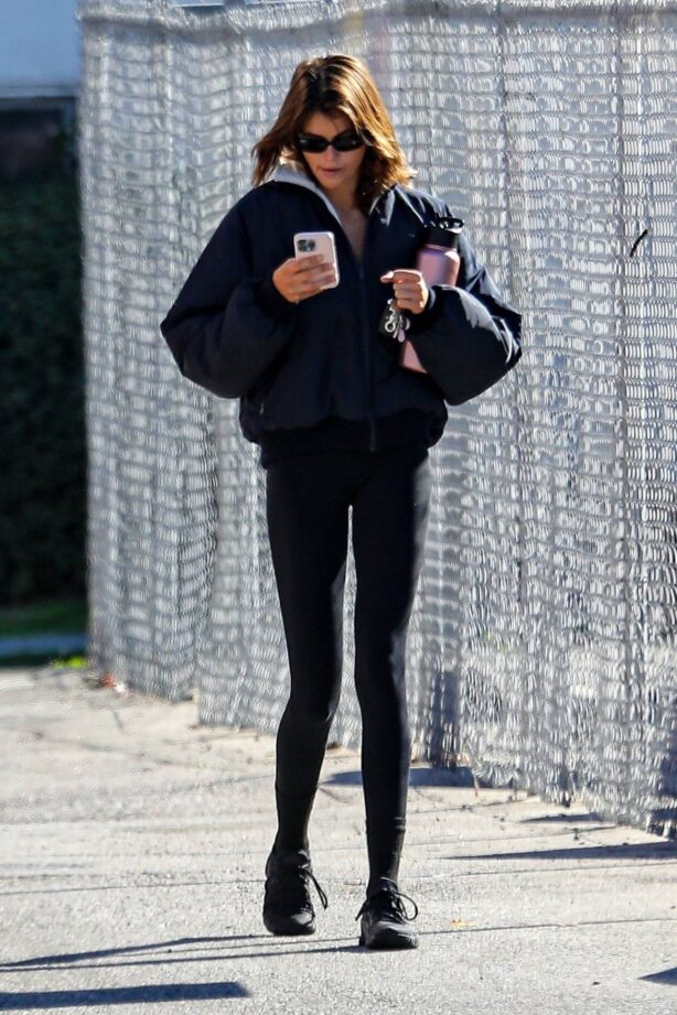 Kaia Gerber - On her phone after a workout in Brentwood