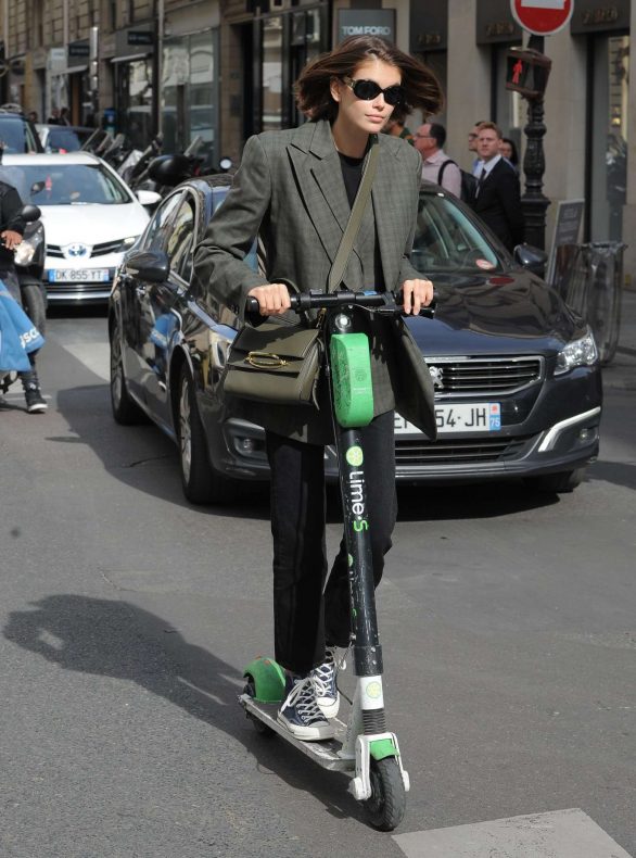 Kaia Gerber - Riding around the streets on a scooter in Paris