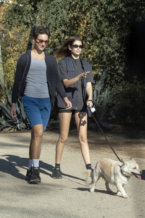 Kaia Gerber - Takes her dog out for a walk in Los Angeles