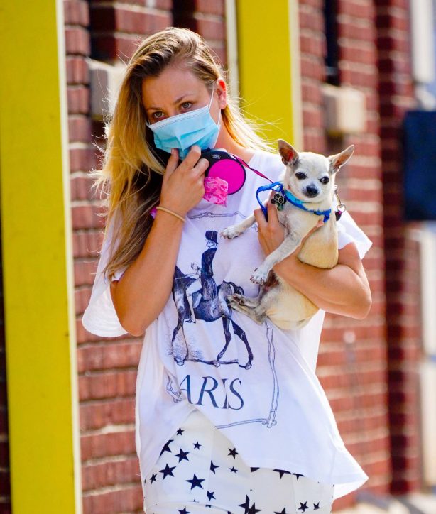 Kaley Cuoco - out with her pup in New York City