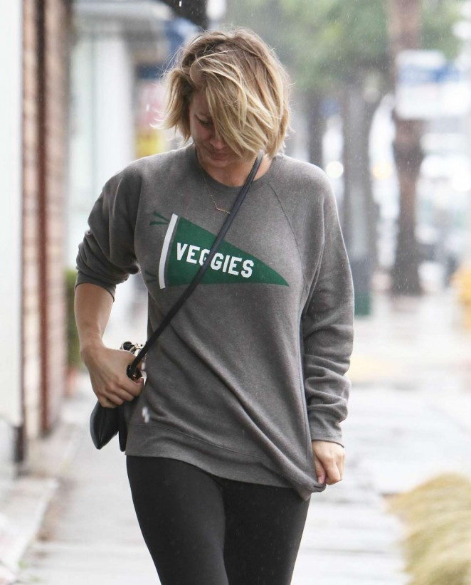 Kaley Cuoco - Wet on rain leaving the Gym in Los Angeles