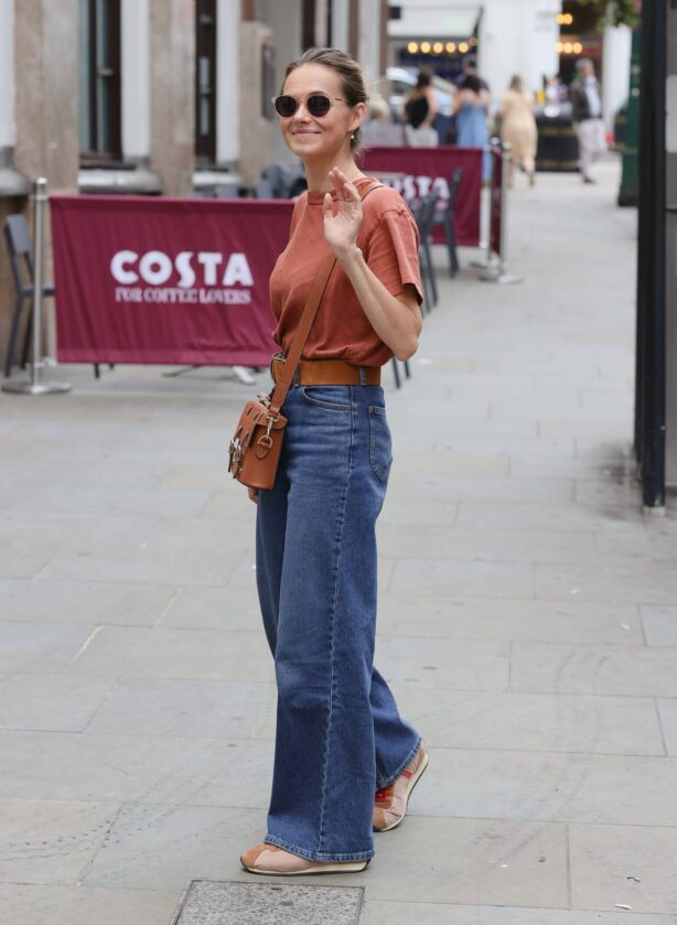 Kara Tointon - In flared denim pants stepping out in London